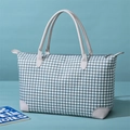 Grand sac de voyage avec motif pied-de-poule classique et détails en cuir gris clair - Bleu