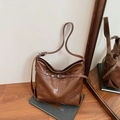Vintage brown leather tote bag with silver buckle detail and spacious shoulder strap - Brown