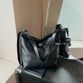 Minimalist black glossy PU leather tote bag with silver buckle and wide strap - Black