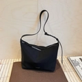 Minimalist black waterproof nylon shoulder bag with adjustable strap and silver zipper - Black
