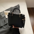 Black litchi grain leather bucket bag with gold hardware and top handle strap - Black