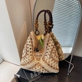 Handmade woven tote bag in beige with dark brown wooden bead handles and geometric pattern - Brown & Beige