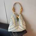 Handcrafted blue and white crochet tote bag with wooden bead handle and diamond pattern - Blue