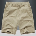 Pantaloncini casual kaki da uomo, vestibilità ampia minimalista con tasche laterali e bottone - EU 29 / Cachi