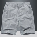 Pantaloncini casual da uomo grigio medio in cotone con bottone e tasche laterali - EU 29 / Grigio