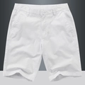 Men's minimalist white cotton chino shorts in a loose straight fit for casual beach wear - EU 29 / White