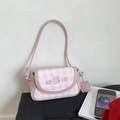 Detail of pink plaid PU leather bag with cute bear embroidery and cookie pendant - Pink