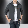 Men's outdoor hooded jacket in dark grey with windproof zip pockets and logo - M / Gray
