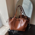 Brown glossy PU leather tote bag with decorative bow and drawstring side details - Brown