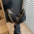 Black leather half-moon shoulder bag with decorative gold chain and slim strap - Black