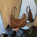 Retro brown leather half-moon shoulder bag with a bold gold decorative chain - Brown
