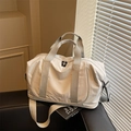 Off-white large capacity travel bag with thick handles and adjustable shoulder strap - Off White
