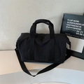 Sac de voyage minimaliste en nylon noir avec poignées renforcées et bandoulière - Noir