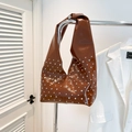 Brown patent leather tote bag with silver studs and knotted shoulder strap design - Brown