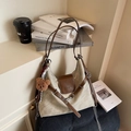 Khaki canvas tote bag with brown leather trim and a cute plush bear keychain - Beige With Charm