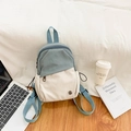 Minimalist blue and cream canvas backpack with front zip pocket for travel and school - Blue
