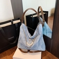 Light blue bow shoulder bag with pearl chain detail and brown leather straps - Blue