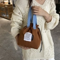 Braune Lunchtasche aus Canvas mit blauen Griffen und Kordelzug für den täglichen Weg - Braun