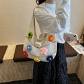 White crochet hobo bag with colorful 3D knitted flowers and handmade floral pattern - Khaki