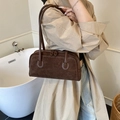 Minimalist dark brown suede baguette bag with white contrast stitching and double handles - Coffee
