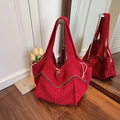 Large red hand-knit tote bag with wave-pattern texture and green trim finish - Burgundy