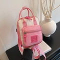 Mini sac à dos rose et blanc cassé avec double fermeture et logo prin prin chic - Rose
