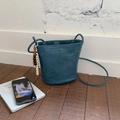 Peacock blue woven bucket bag with elegant wooden bead charms and shoulder strap - Iceland Blue