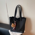 Large black canvas tote bag with brown plush bear charm and woven rope detail - Black with Pendant