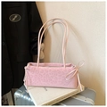 Detail of pink leopard print shoulder bag featuring a side bow and nylon texture - Pink