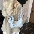 Chic light blue hobo bag in litchi grain leather with matching mini pouch accessory - Blue