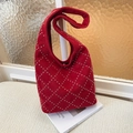 Vintage red suede bucket bag featuring silver rivets and diamond lattice pattern design - Red