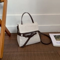 Chic beige canvas crossbody bag with brown leather trim and stylish buckle detail - Black