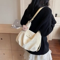 Minimalist cream white tote bag with silk texture, pleats, and pink plush bear charm - With Charm / Off White