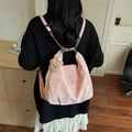 Pink pleated backpack for women with a cute plush bear charm and sleek nylon finish - With Charm / Pink