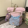 Multi-color trekking backpack in pink, lilac, and sky blue with a side pouch - Purple