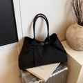 Black large capacity travel tote bag with pleated texture and stylish red interior lining - Black
