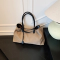 Khaki large capacity canvas travel tote bag with black straps and decorative metal buckle - Khaki