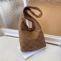 Brown suede hobo shoulder bag featuring silver metal rivets in a diamond pattern - Khaki
