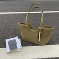 Olive green woven tote bag with wooden bead charm and minimalist double handle - Elm Green