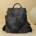 Women's charcoal gray faux leather backpack with fabric straps and tassel detail - Black