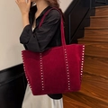 Large burgundy suede tote bag featuring metallic silver stud trim and modern shoulder strap - Burgundy