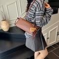 Brown matte leather shoulder bag with bear pendant and embossed logo detail - Brown