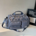 Große nebelblaue Reisetasche mit mehreren Taschen und verstellbarem Schultergurt - Blau