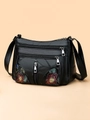 Classic black leather crossbody bag for middle-aged women with floral embroidery design - Black
