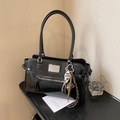 Chic black glossy leather tote bag with silver hardware and trendy woven charms - Black with Pendant