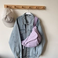 Light purple canvas dumpling crossbody bag with adjustable wide strap and woven zipper pull - Lilac Small