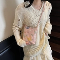 Pale pink fabric crossbody bag featuring delicate butterfly and floral embroidery detail - Pink