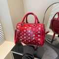 Red patent leather Boston bag with silver studs and adjustable shoulder strap - Red