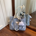 Blue geometric woven tote bag with white leather handles and cloud charm accessory - Blue with Charm