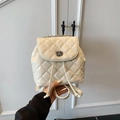 Chic cream white quilted backpack with chain straps and silver twist-lock closure - White